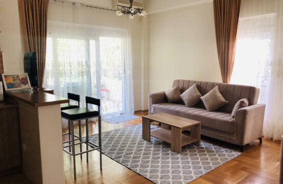 Two-bedroom apartment with a pool in a gated complex