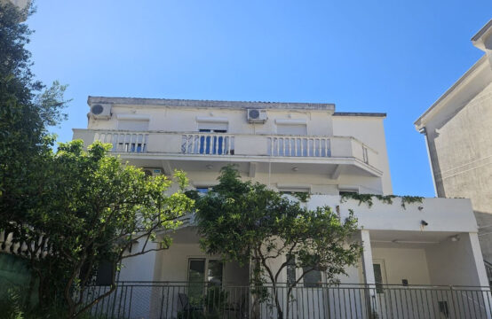 A three-story house in the city center